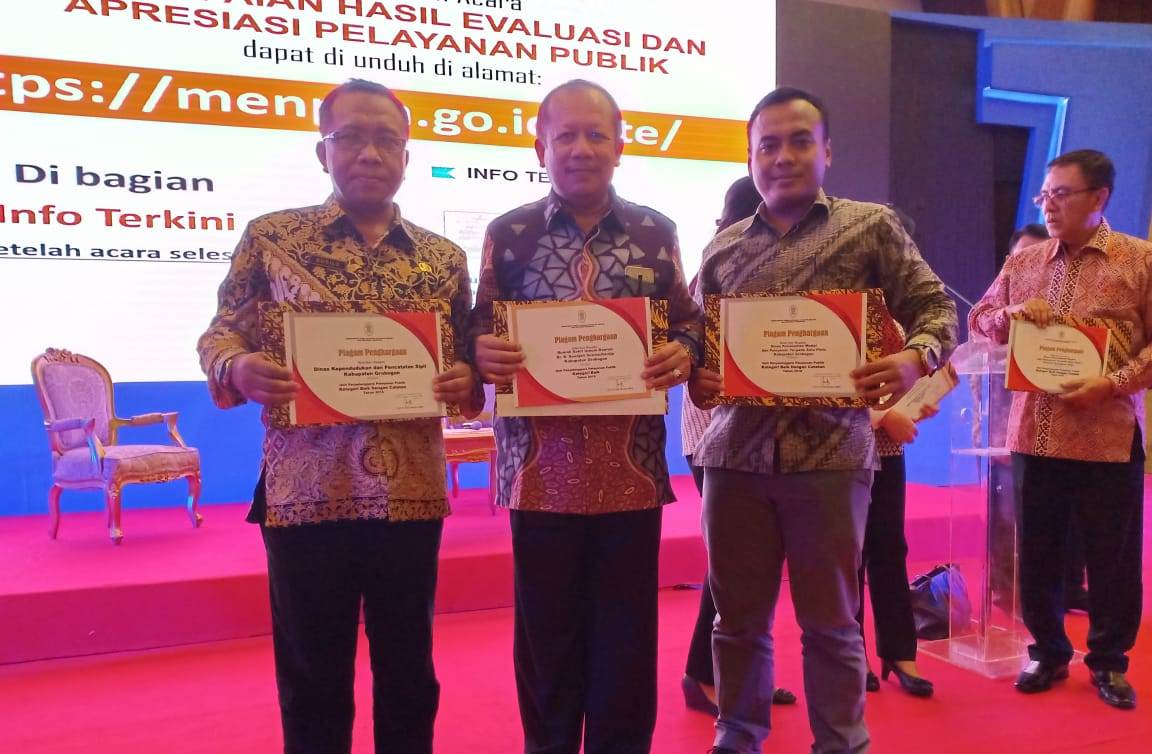Dispendukcapil Raih Piagam Penghargaan Pelayanan Publik Tahun 2018 